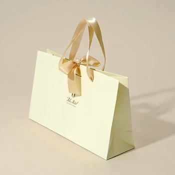 500 бр. Луксозен плик с потребителско лого, опаковки, пакет за подаръци с дръжка и лък, разработени Специални висококачествени пакети
